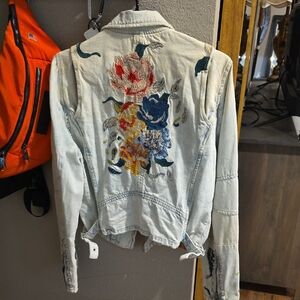 Blue Jean Jacket with Vibrant Floral Design